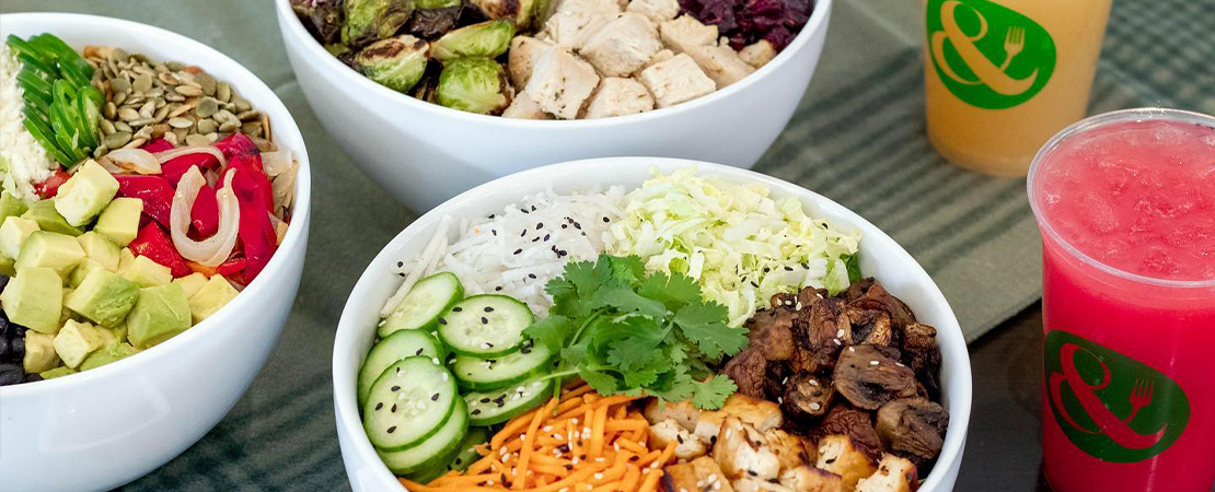 Crisp & Green bowls of salad.