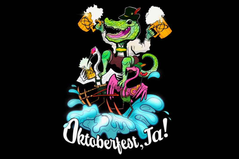 Cartoon illustration of an alligator dressed in traditional German Oktoberfest attire, holding two frothy beer mugs, while riding on top of a pink flamingo and a white stork. The characters appear to be on a wooden raft splashing through water. Below the scene is the text 'Oktoberfest, Ja!' in bold white lettering.